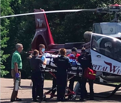 Explosion Lawyer- Fayette Cty. EMS load patient onto medical helicopter